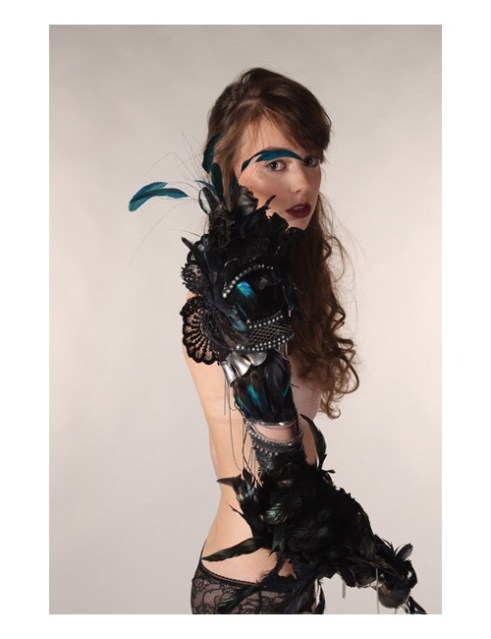 Grace Mandeville, actor, wearing Feather Armour. Photo by Charlotte Epstein. Source: The Alternative Limb Project.